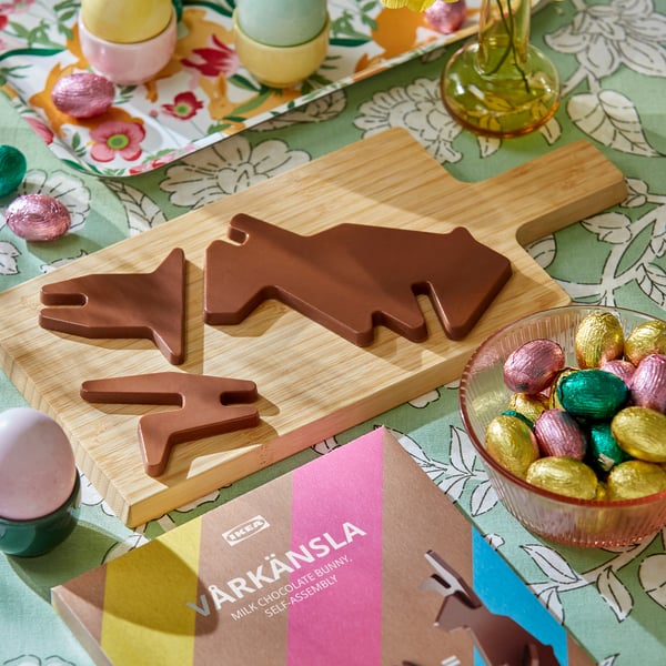 Chocolate bunny kit: 3 pieces in box, ready to assemble. Eggs and candy around.
