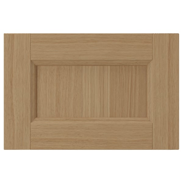 VEDHAMN natural wood cabinet door. Square shape with oak panel, solid oak frame. Warm, earthy tone.