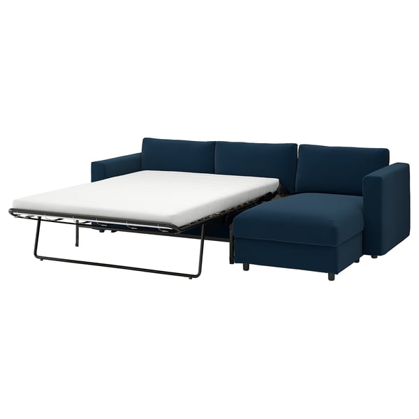 Blue convertible sofa-bed with left or right chaise, thick mattress, storage, and removable machine-washable cover.