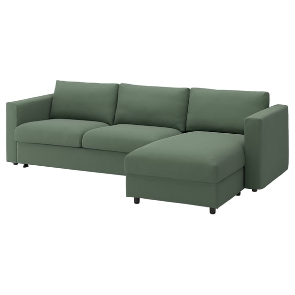 A green 2-seat sofa-bed with a chaise longue, modern design, and removable cushions.