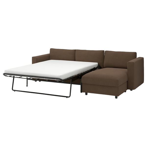 Brown convertible sofa with white mattress, metal base, and textured chenille fabric.