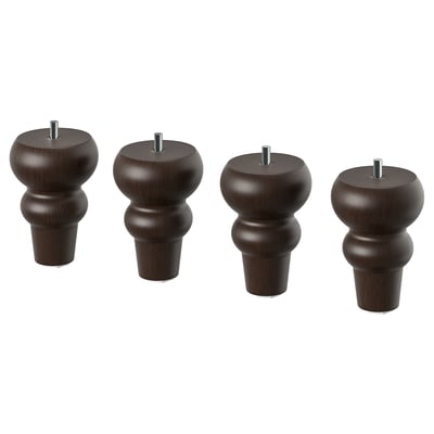 Four dark brown, curved, wooden furniture legs with screws on top.